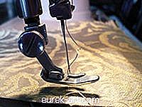 Verwendung einer tragbaren Singer Stitch Sew-Handnähmaschine